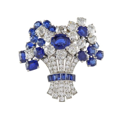 Sapphire and diamond tied bouquet brooch by Cartier, London, of stylised design,